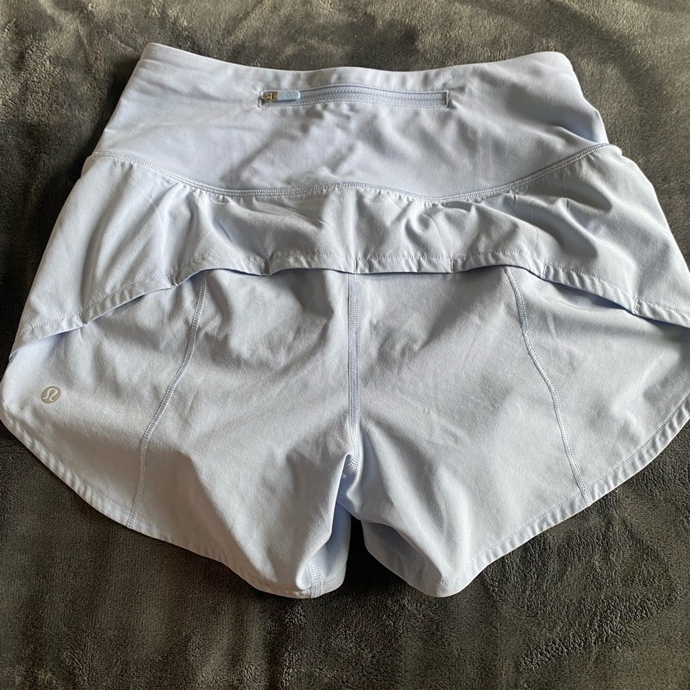 Pastel Blue high rise speed up Lululemon shorts. Size 4. 4 inch inseam